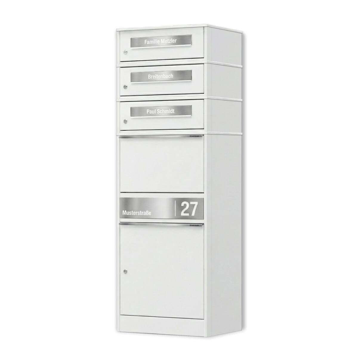 White mailbox bank with four small drawers labeled with names and a bottom locker showing 'Musterstraße 27'.