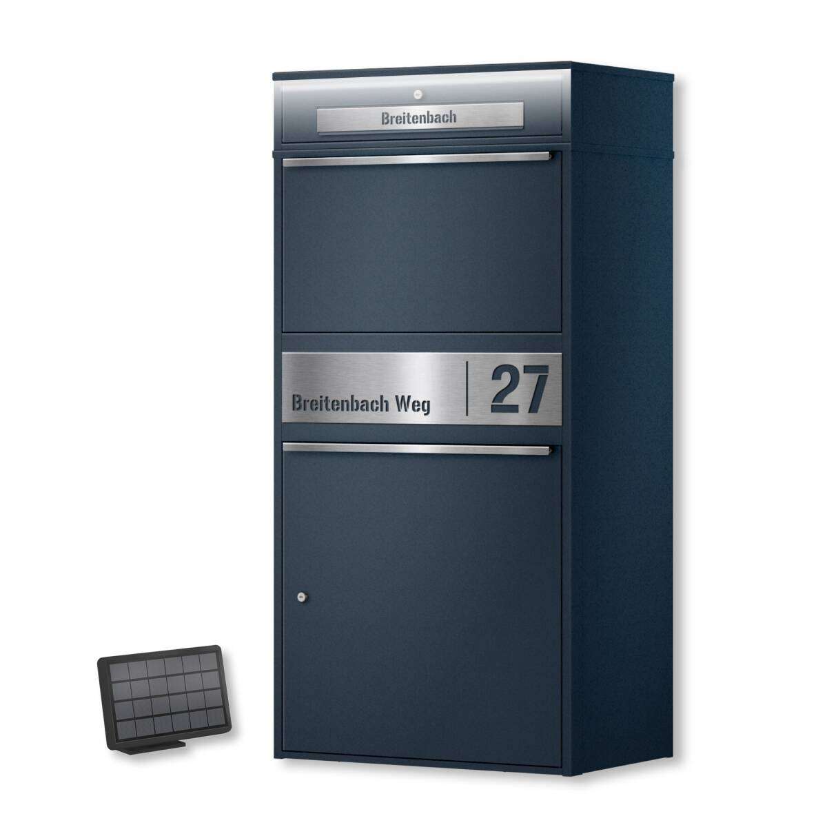 Outdoor modular mailbox with address plate reading ‘Breitenbach Weg 27’ and a small solar panel nearby