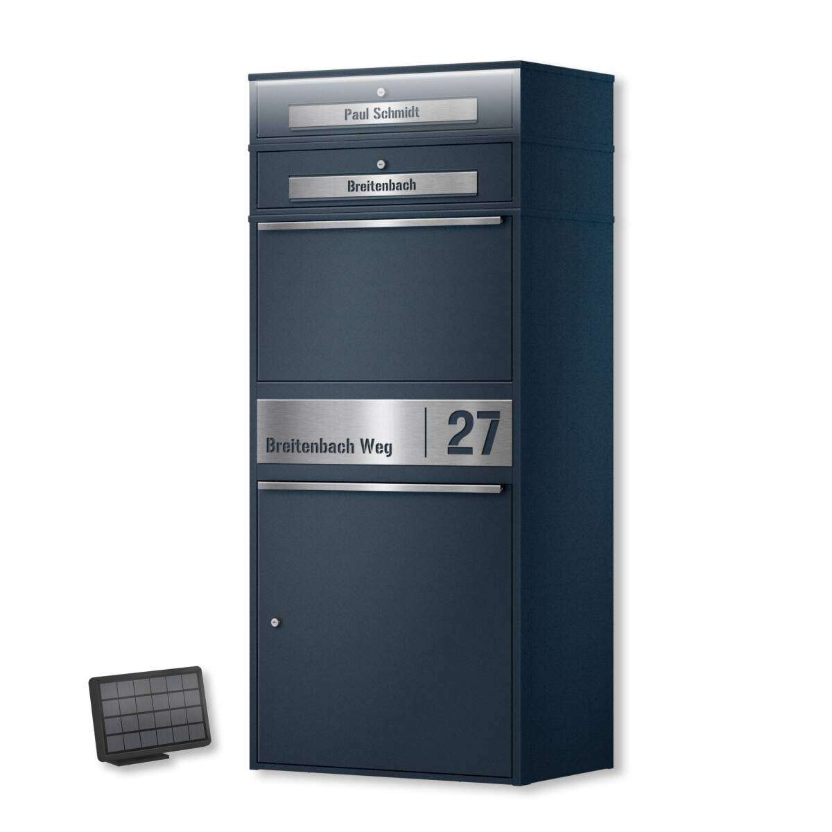 Blue multi-drawer street postbox with nameplates and address label 'Breitenbach Weg 27'; a small solar panel sits on the left.