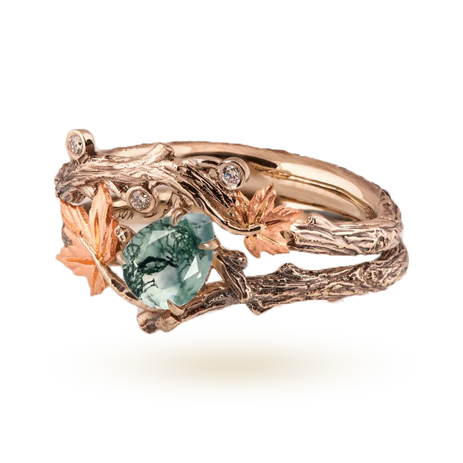 Rose-gold ring with carved leaf design, a large green gemstone centerpiece, and small diamond accents.
